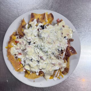 Jalapeno Cheese Dipped Nachos.